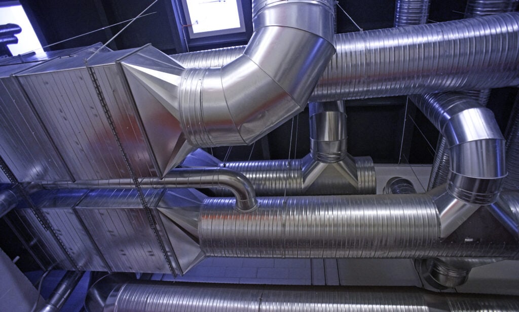 Ventilation pipes and ducts of industrial air condition bakery and food production deep cleaning