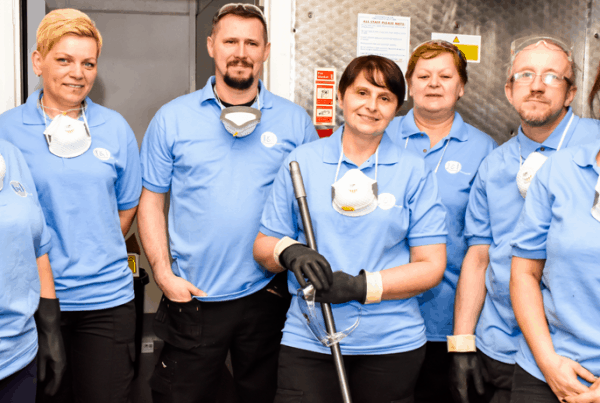 Team photo in kitchen