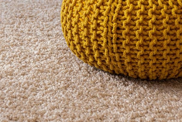 cushion on freshly cleaned carpet - carpet cleaning